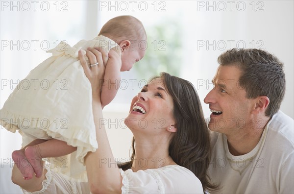 Proud parents and their baby daughter.