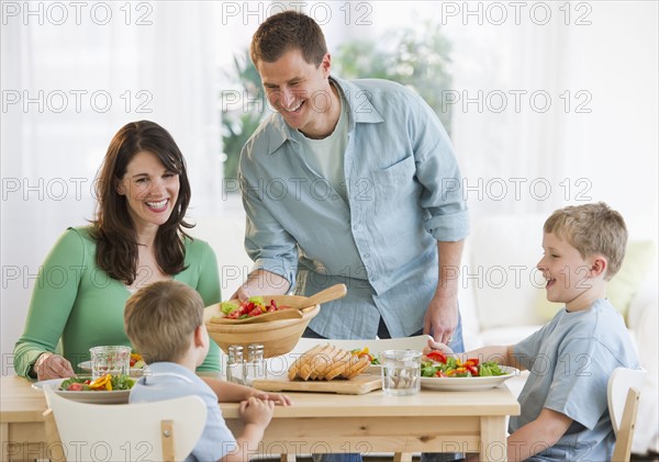 Family eating dinner.