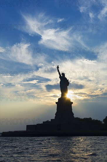 Statue of liberty at dusk.