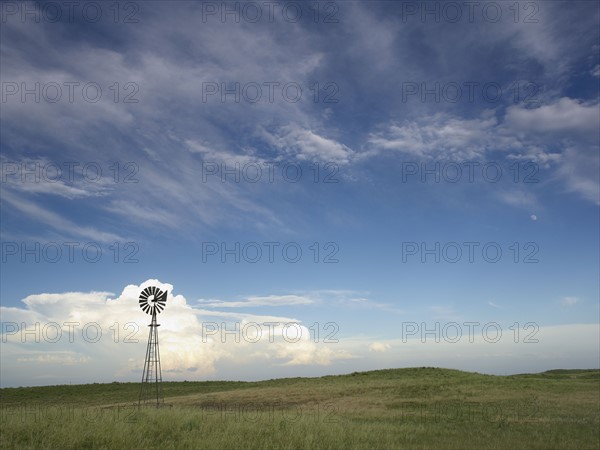 Windmill in field. Photo. John Kelly