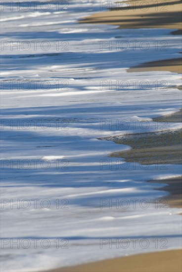 Tide on Caribbean beach. Photo : Antonio M. Rosario