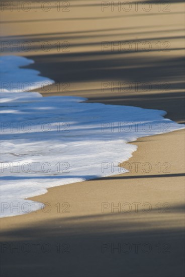 Tide on Caribbean beach. Photo : Antonio M. Rosario