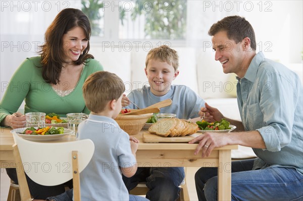 Family eating dinner.