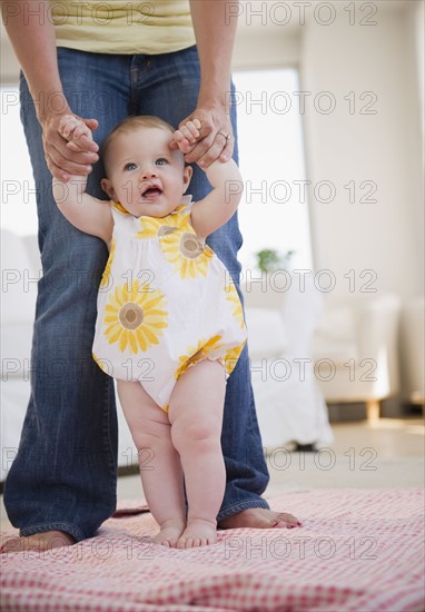 Baby's first steps. Photo. Jamie Grill