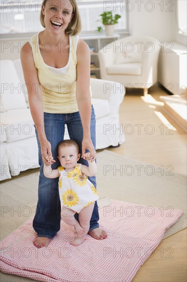 Baby's first steps. Photo. Jamie Grill