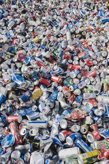 Pile of aluminum cans at recycling plant.