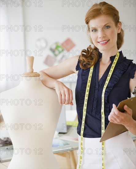 Seamstress in her studio. Photo : Jamie Grill