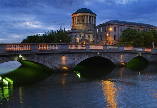 Bridge over River Liffey at night.