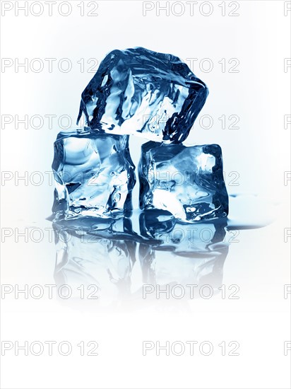 Melting ice cubes. Photo. David Arky