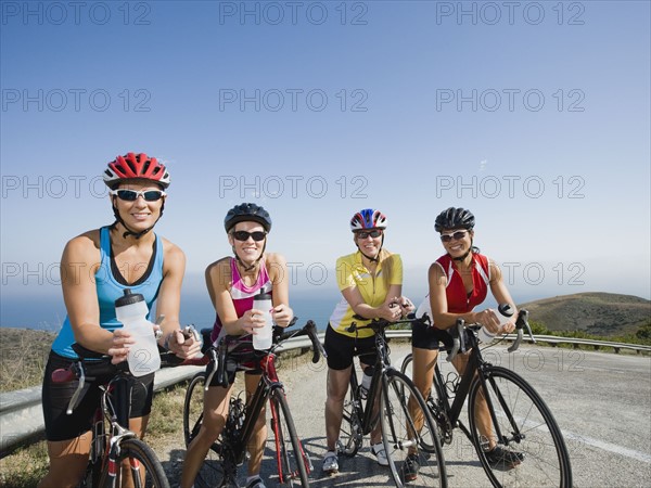 Cyclists stopping for a water break.