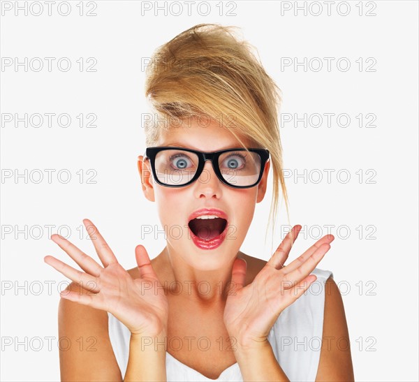 Shocked glamorous blond woman. Photo. momentimages