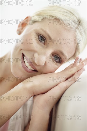 Pretty blond woman relaxing. Photo. momentimages