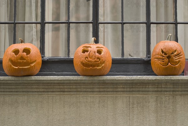 Jack-o-lanterns on window sill. Photo. Antonio M. Rosario