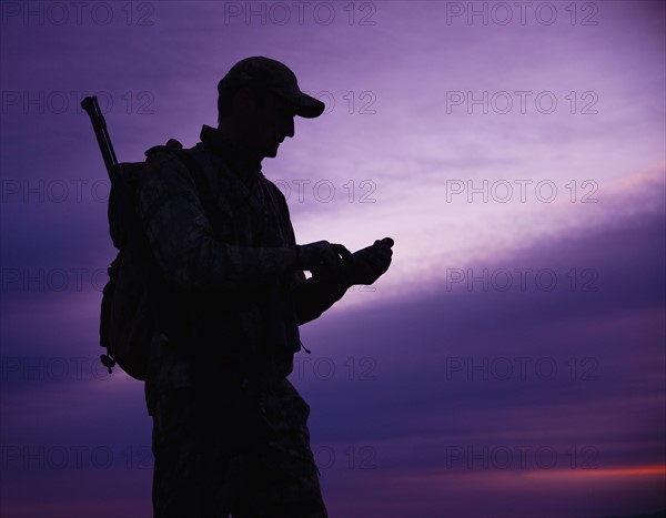 Big game hunter at dusk. Photo : Mike Kemp