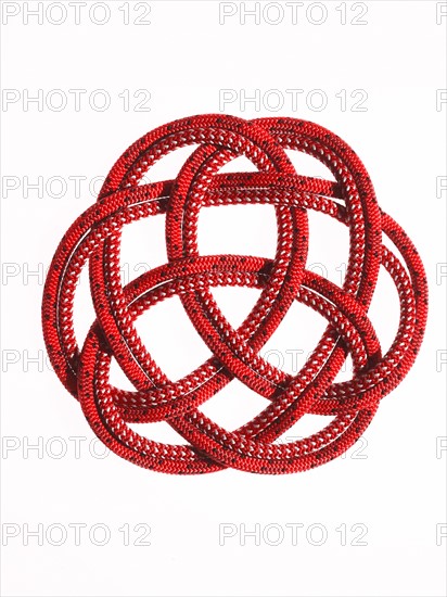 Red rope looped together. Photo. David Arky