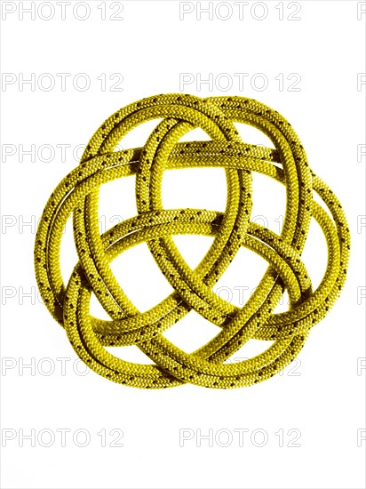 Yellow rope looped together. Photo. David Arky