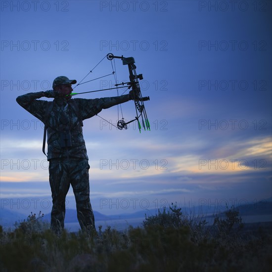 Bow and arrow hunter. Photo. Mike Kemp