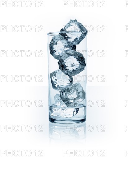 Ice cubes in glass. Photo. David Arky