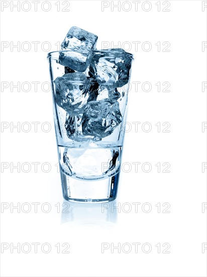 Ice cubes in glass. Photo. David Arky