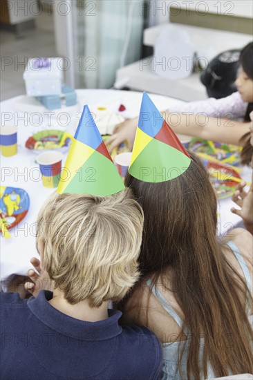 Children at a birthday party. Photo. momentimages