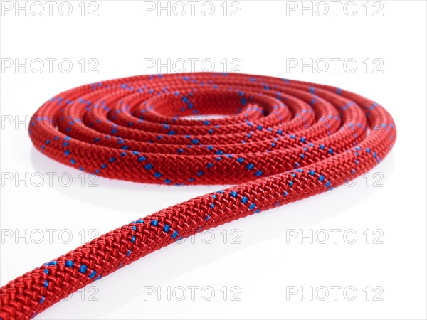 Red and blue rope in a circular pattern. Photo. David Arky