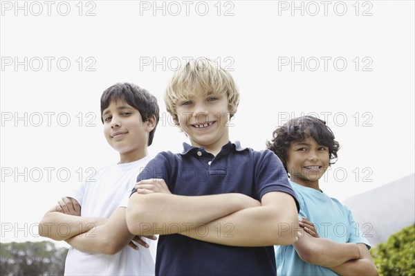 Three cute boys. Photo : momentimages