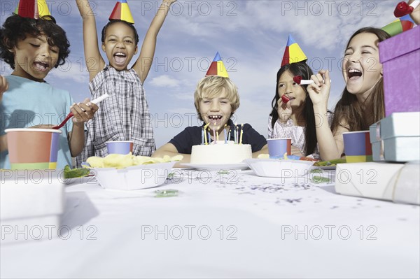 Children at a birthday celebration. Photo. momentimages