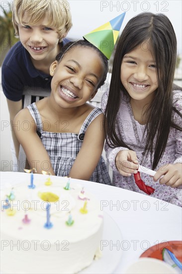 Children at a birthday celebration. Photo. momentimages