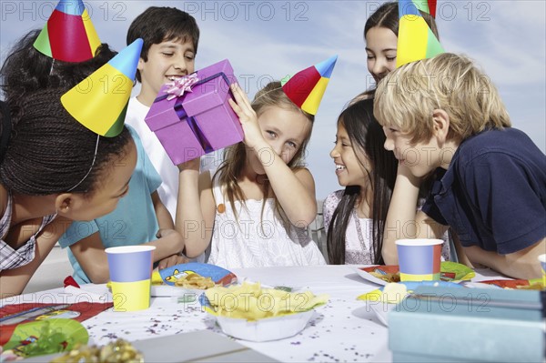 Children at a birthday celebration. Photo. momentimages