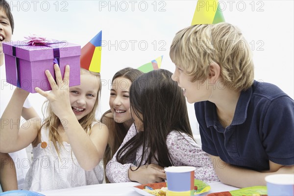 Children at a birthday celebration. Photo. momentimages