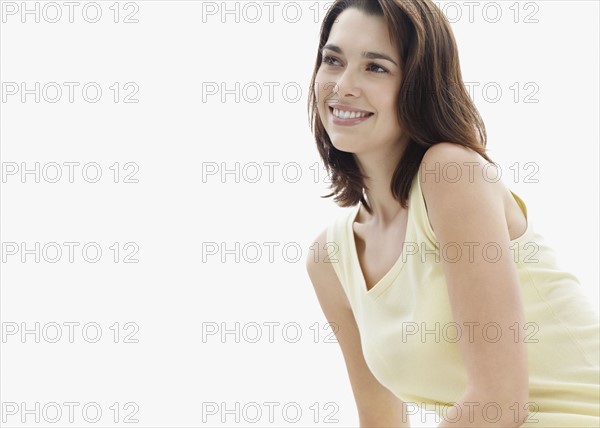 Smiling brunette woman. Photo. momentimages