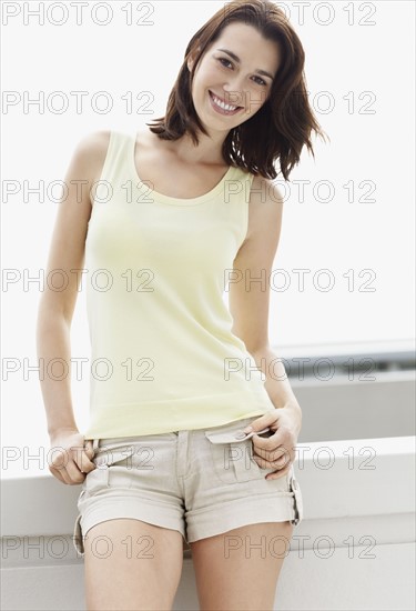 Smiling brunette woman. Photo. momentimages