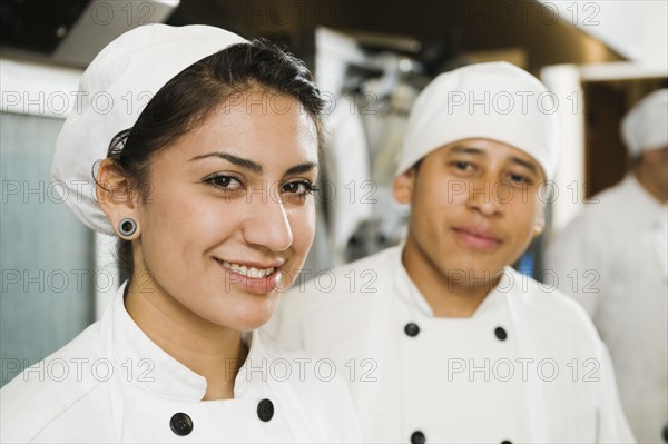 Chefs in bakery.