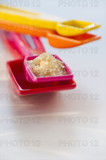 Salt and measuring spoons. Photo. Daniel Grill