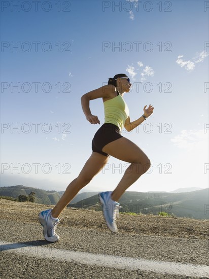 Runner training on a road in Malibu.