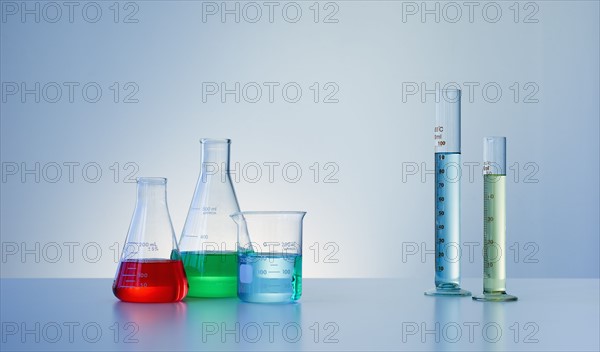 Beakers and flasks with colorful liquids.