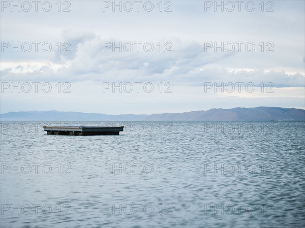 Raft floating on water.