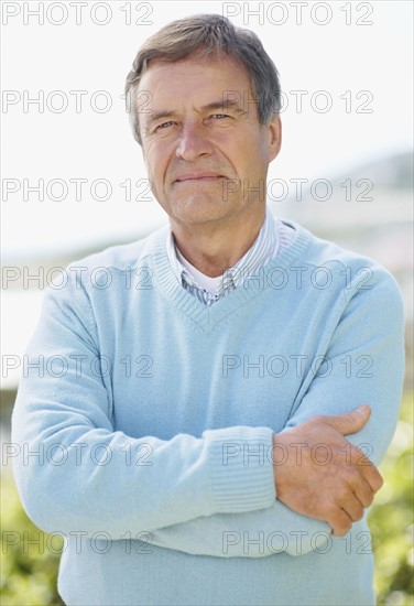 Portrait of smiling senior man. Photo : Momentimages