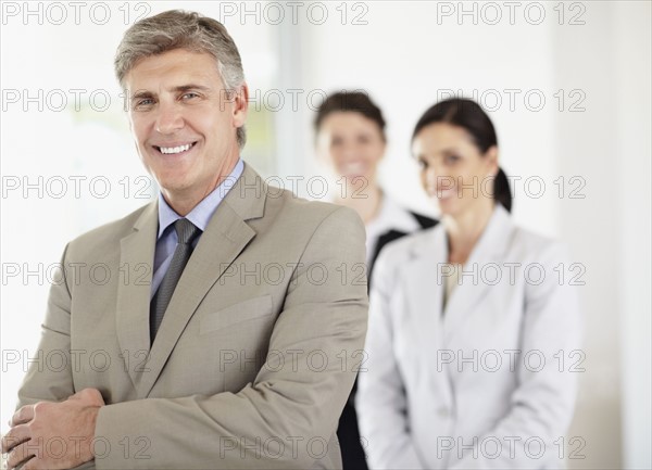 Portrait of cheerful businessman. Photo : Momentimages