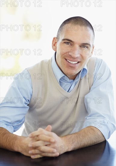 Portrait of cheerful mid adult man. Photo : Momentimages