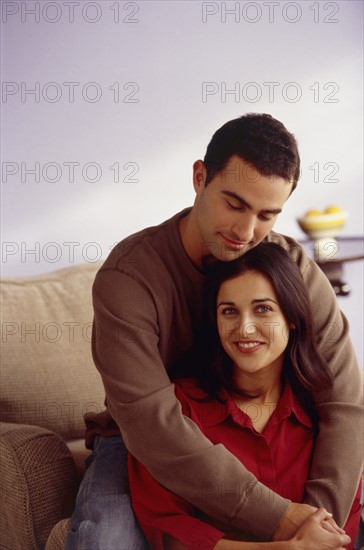 Couple embracing. Photo : Fisher Litwin