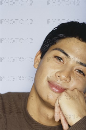 Daydreaming young man. Photo : Fisher Litwin