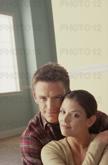 Happy couple in their home. Photo : Fisher Litwin