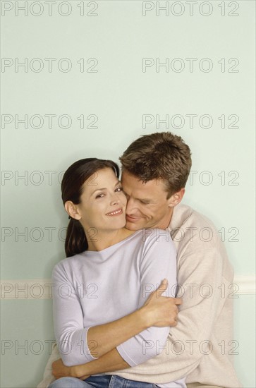 Happy couple in their home. Photo : Fisher Litwin