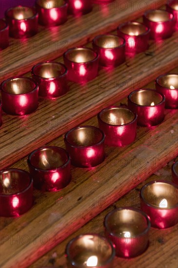 Rows of candles in cathedral. Photo : Antonio M. Rosario