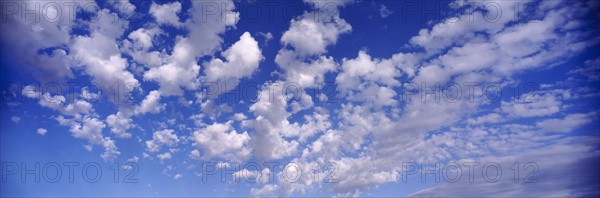 Clouds and blue sky. Photo : Fisher Litwin