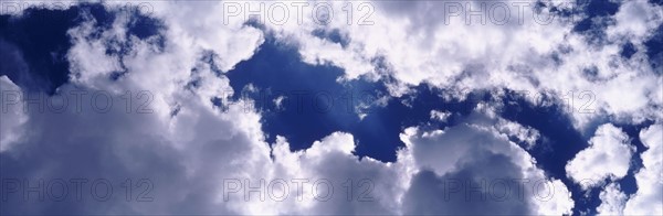 Clouds and blue sky. Photo : Fisher Litwin