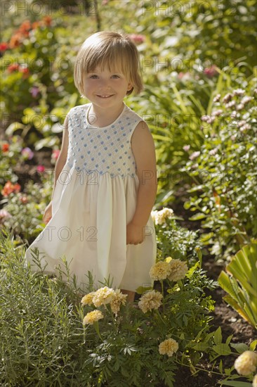 Portrait of girl (2-3) in garden. Photo : FBP