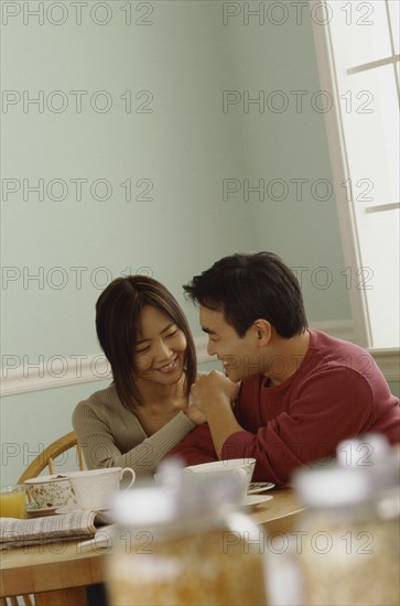 Happy couple in their home. Photo : Fisher Litwin