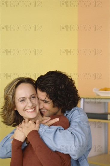 Couple embracing. Photo : Fisher Litwin